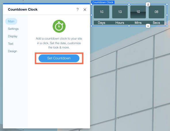 A screenshot of the Wix Countdown Clock app in Wix Editor. Settings are open, Set Countdown is highlighted.