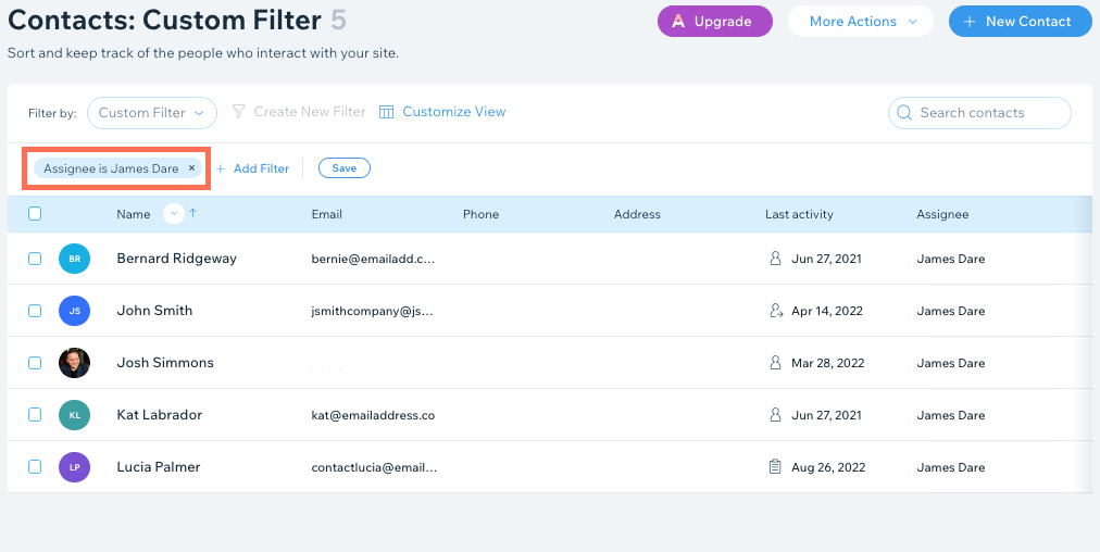 A screenshot of the Wix Dashboard Contacts page. The Contacts list is filtered by Assignee.