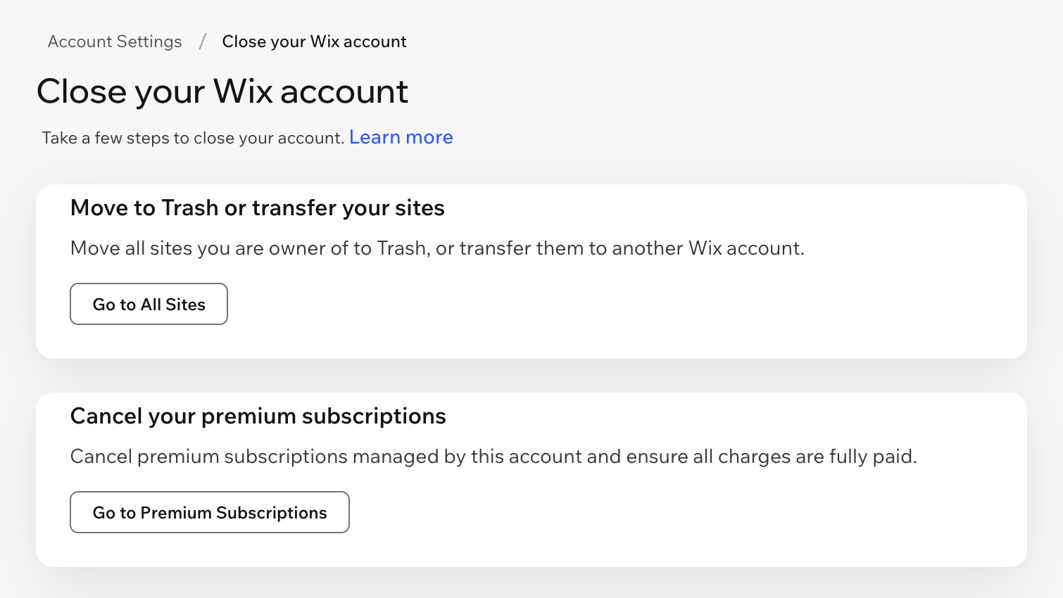 Captura de pantalla de la página Cierra tu cuenta de Wix, que muestra la tarjeta Enviar a la papelera o transferir tus sitios y la tarjeta Cancelar tu suscripción Premium.