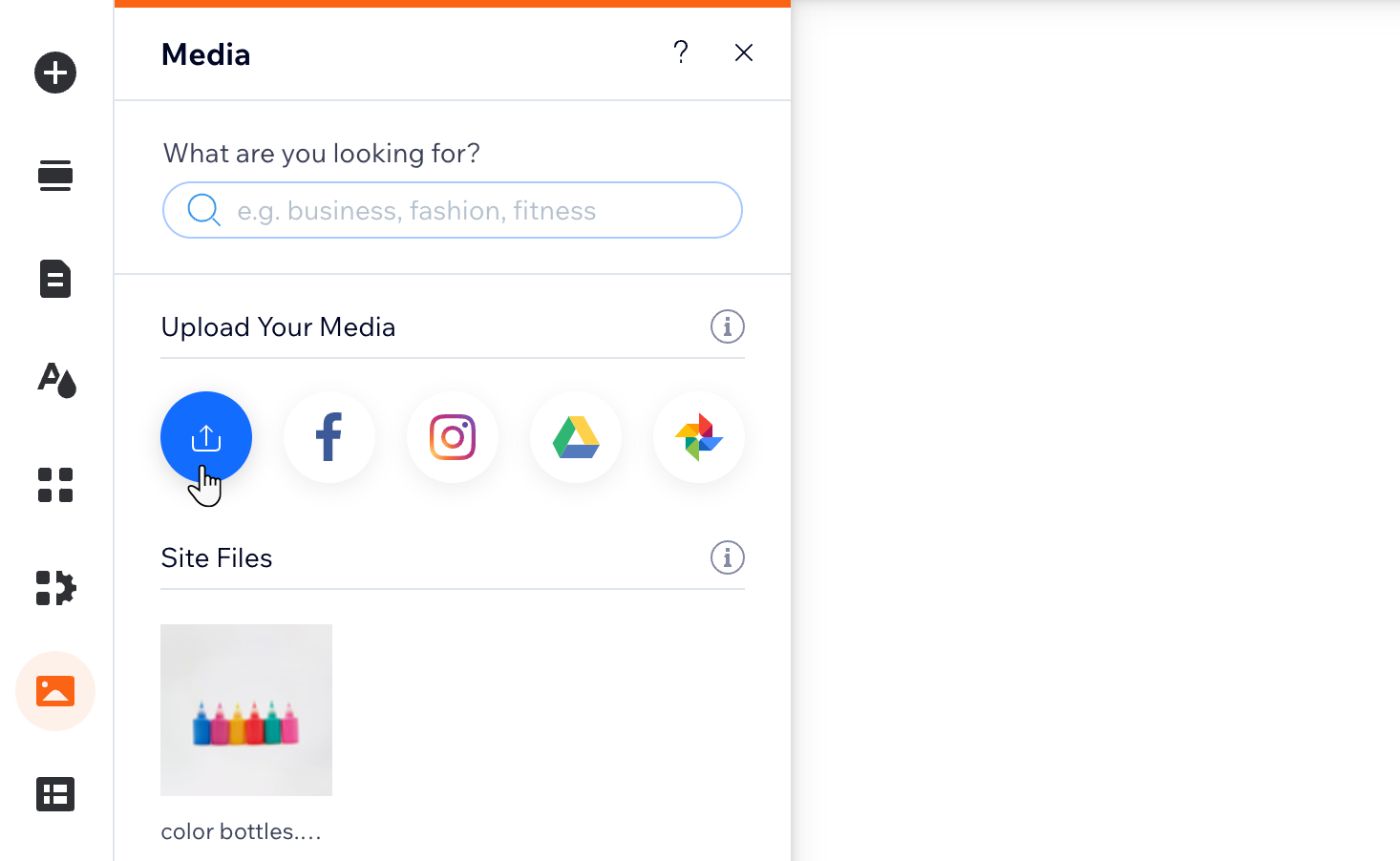 Captura de tela do botão de upload de mídia no Editor Wix.