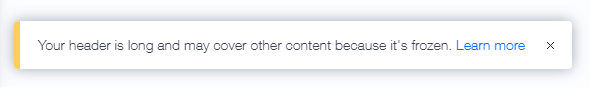 A notification advising that the header is long and may cover other content on the site.