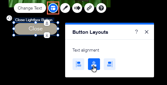 Le panneau de mise en page du bouton Fermer. Le curseur survole l'option pour aligner le texte au centre.