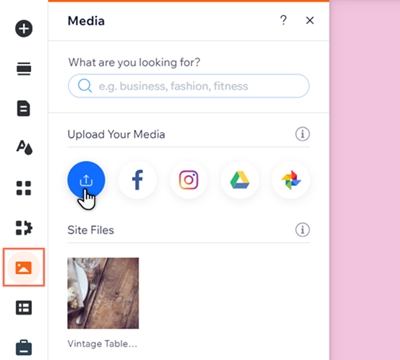 The Media panel in the Wix Editor. The cursor is clicking over the upload icon.