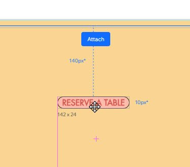 A button being placed in a section cell. The Attach message is displayed.