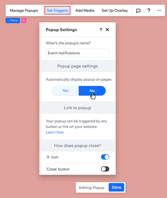 The popup settings panel is open. The cursor is disabling the automatic display option.