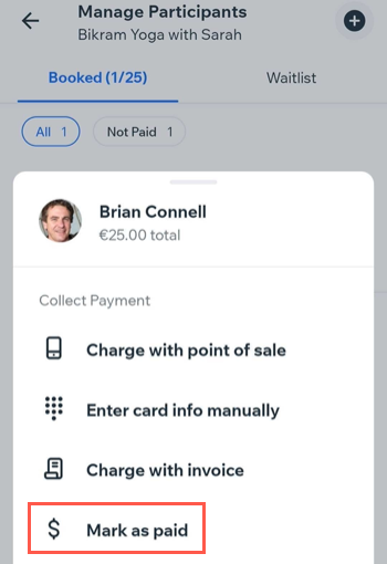 A screenshot showing how to mark a participant's class session as paid.