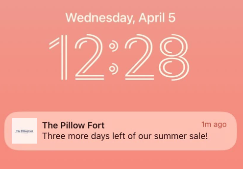 A screenshot of a mobile device home screen with a push notification from a branded app.