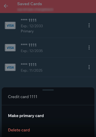The Saved cards section in the Wix Spaces app, on Android, showing the options when selecting a card