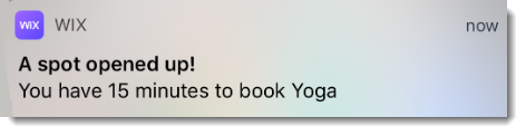 A screenshot of a phone notification showing clients that a spot in a class has become available.