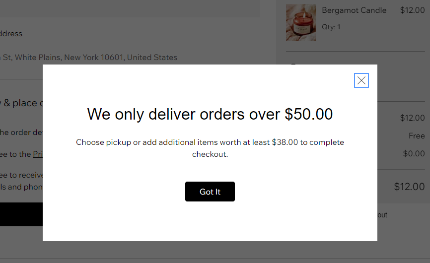 Image of checkout page displaying the message that customers see if they haven't reached the store's minimum amount