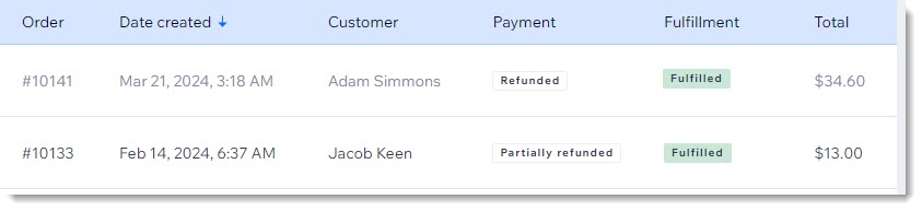 Screenshot of the Orders page in the Wix dashboard, showing a refunded and a partially refunded order