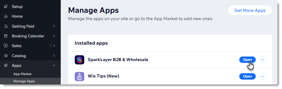 Screenshot of the Manage Apps page in the Wix dashboard showing how to open the SparkLayer B2B app