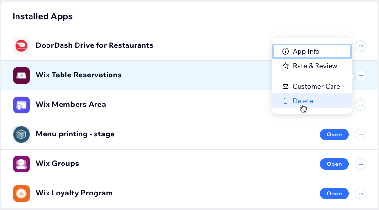 Captura de pantalla de hacer clic en el icono de más acciones y hacer clic en eliminar junto a la aplicación Wix Table Reservations.