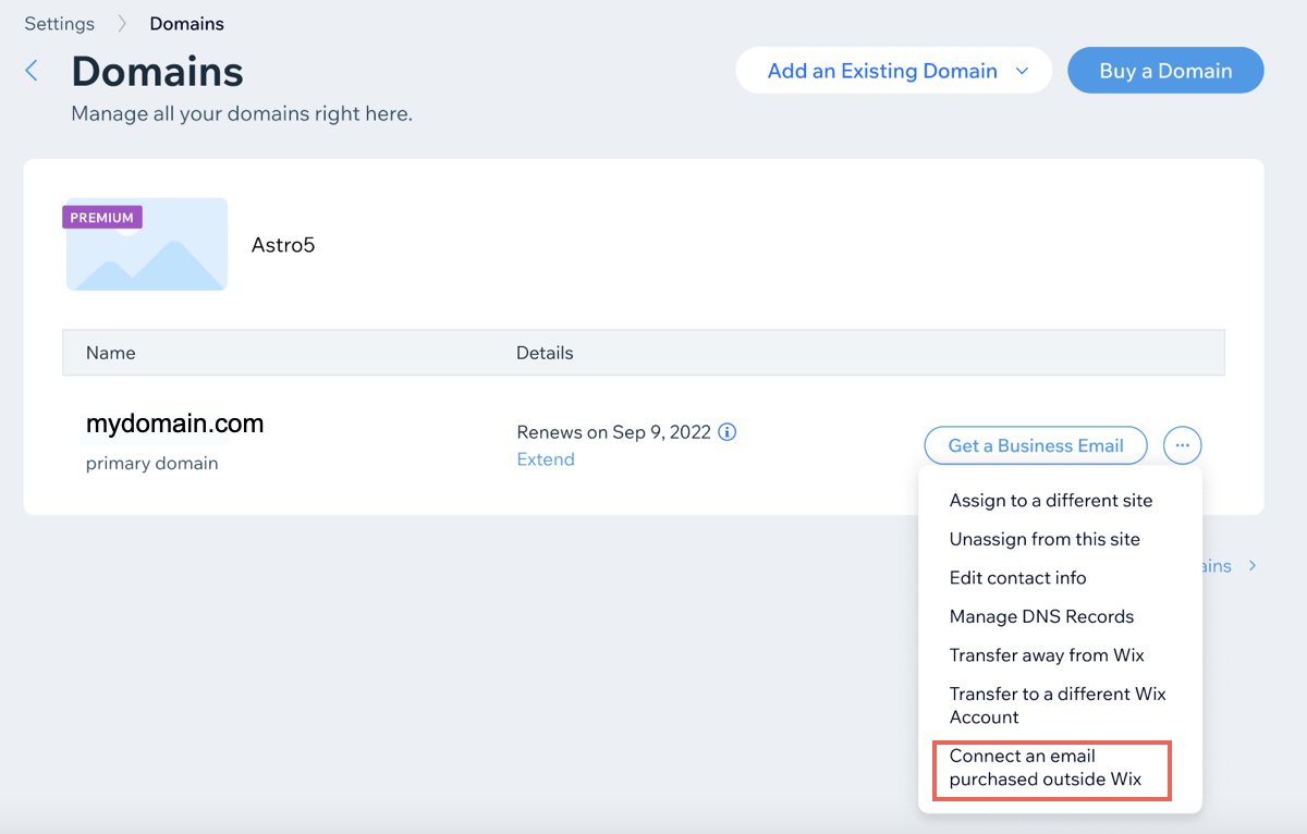 A screenshot of the Domains page showing how to navigate to the 'Connect an email purchased outside of Wix' section.