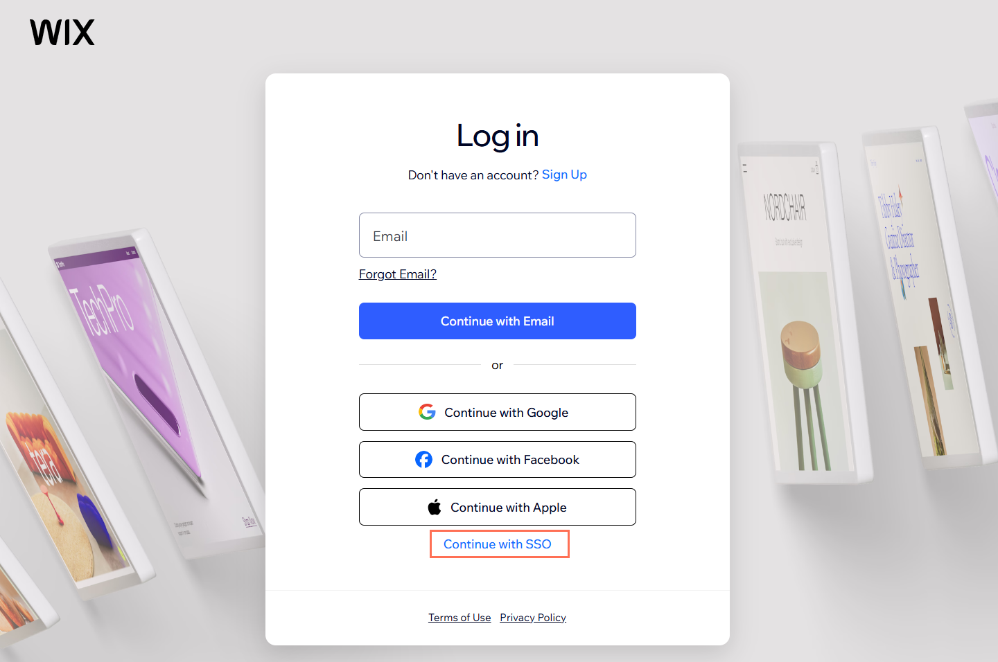 A screenshot showing the Wix login screen. The SSO login option is highlighted.